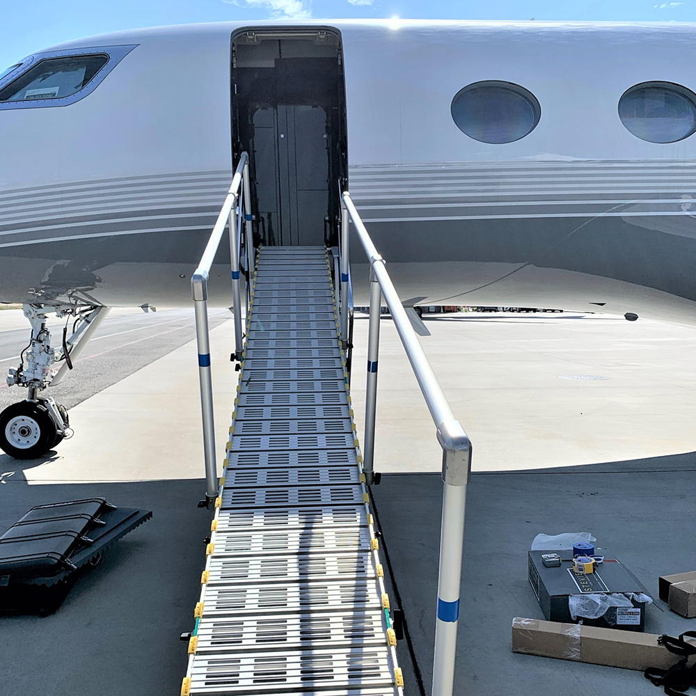 Roll-a-ramp, rampe enroulable mobile en aluminium, accès pour avion
