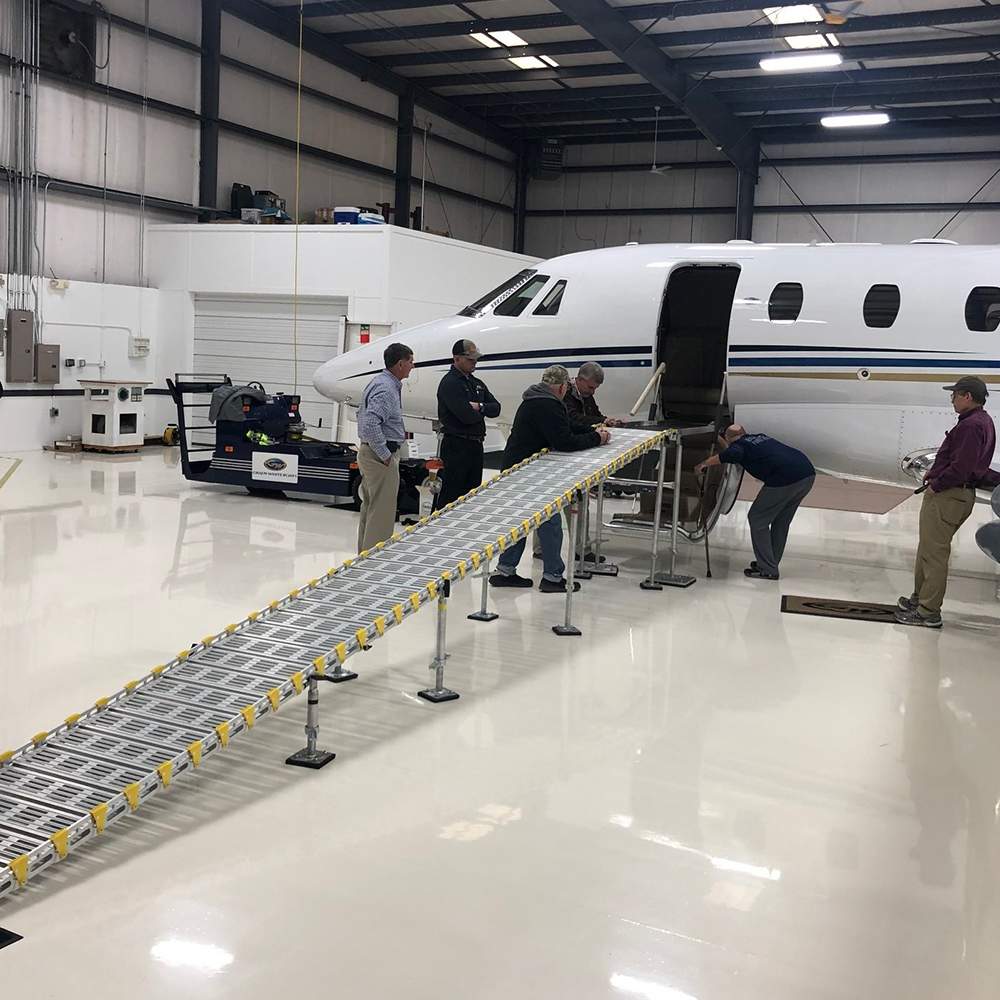 Roll-a-ramp, rampe enroulable mobile en aluminium accès avions